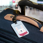 Winter Rabbit Personalized Bag Label | Sky Bagagelabel<br><div class="desc">Dit schattige gepersonaliseerde bagagelabel maakt een grote kinder vesting of geschenk voor kleinkinderen. Het ontwerp van de stomme windmachine is voorzien van een blauwe achtergrond van de sneeuwhemel met een schattige afbeelding van het witte konijn, gedecanteerd in een roze winterse pet en sjaal. Personaliseer met een naam of een monogram...</div>