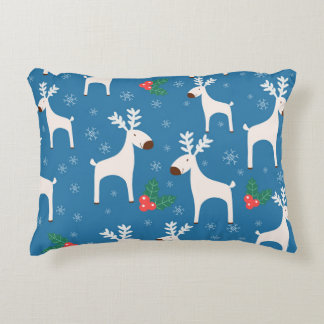 Winterachtergrond met deers (naadloos patroon) en accent kussen