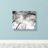 Winterbomen bewolkte lucht canvas afdruk (Insitu (Houten vloer))