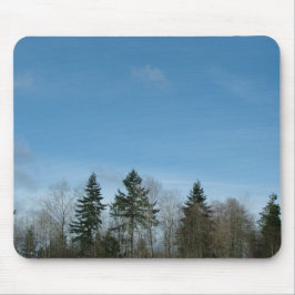 Winterbomen en blauwe lucht muismat