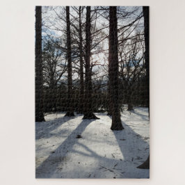 Winterbomen in zonlicht en sneeuw legpuzzel