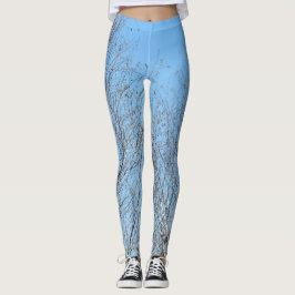 Winterbomen tegen blauwe hemel leggings
