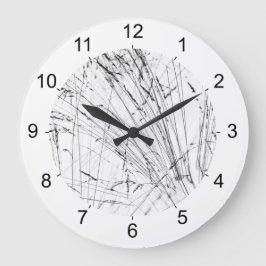 wintergras op sneeuw grote klok