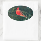 Winterkardinaal in Snowstorm - Verbeterd Ovale Sticker (Tas)