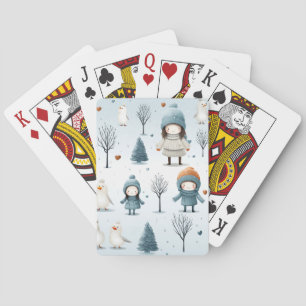 Winterkinderen spelen pokerkaarten