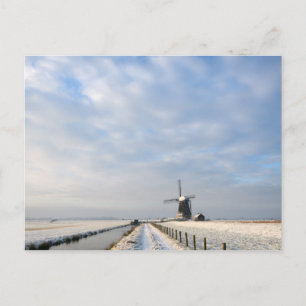 Winterlandschap met sneeuw en windmolen in Nederla Briefkaart