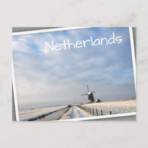 Winterlandschap met sneeuw en windmolen in Nederla Briefkaart