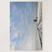 Winterlandschap met sneeuw en windmolen in Nederla Legpuzzel (Verticaal)