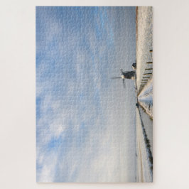 Winterlandschap met sneeuw en windmolen in Nederla Legpuzzel