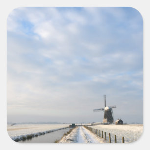 Winterlandschap met sneeuw en windmolen in Nederla Vierkante Sticker