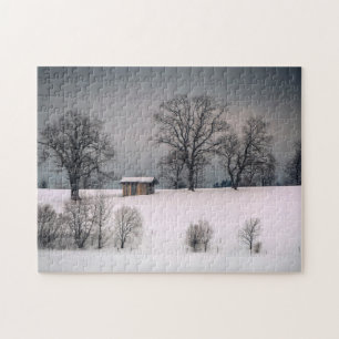 Winterscène, heuvel en bomen, hut legpuzzel