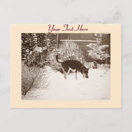 Wintersneeuwscène met schattige zwarte en geelbrui briefkaart