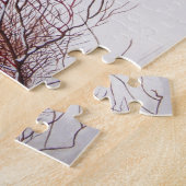 Wintersneeuwscène met schattige zwarte en geelbrui legpuzzel (Zijkant)