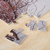 Wintersneeuwscène met schattige zwarte en geelbrui legpuzzel (Zijkant)