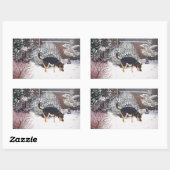 Wintersneeuwscène met schattige zwarte en geelbrui rechthoekige sticker (Vel)