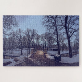 Wintersneeuwstadspark in de avond legpuzzel
