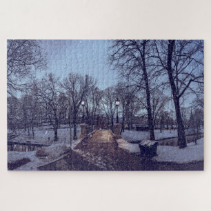 Wintersneeuwstadspark in de avond legpuzzel
