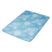 Wintersneeuwvlokken op aqua badmat (Gekanteld)