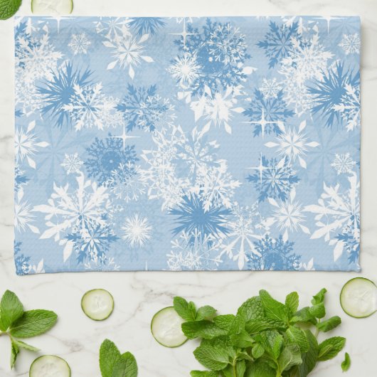 Wintersneeuwvlokken op blauw theedoek (Gevouwen)