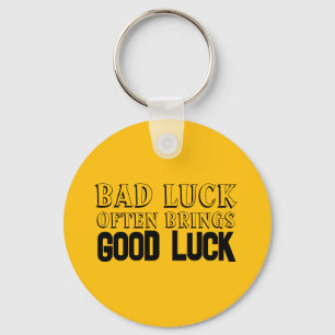 Wisdom gezegde Succes brengt vaak geel zwart Sleutelhanger