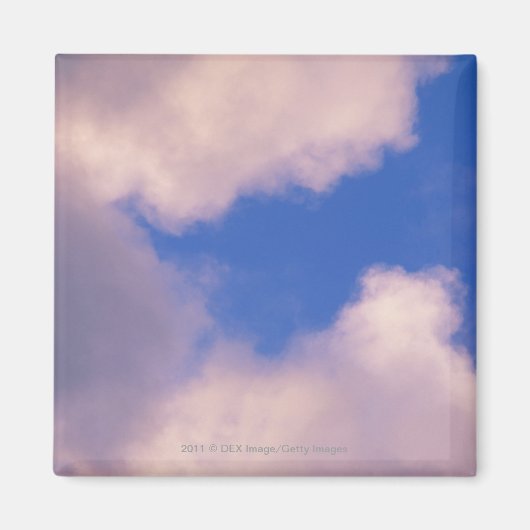Wispy wolken tegen blauwe hemel magneet (Voorkant)