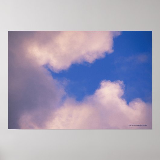 Wispy wolken tegen blauwe hemel poster (Voorkant)