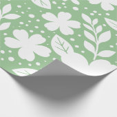 Wit bloemontwerp op een zachte groene achtergrond cadeaupapier (Hoek)
