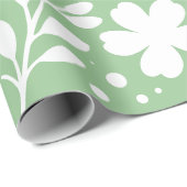 Wit bloemontwerp op een zachte groene achtergrond cadeaupapier (Rol Hoek)