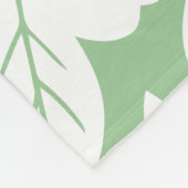 Wit bloemontwerp op een zachte groene achtergrond fleece deken (Hoek)
