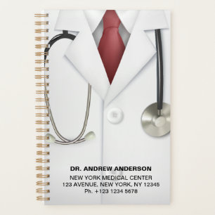 Wit boek voor de benoeming van doctoren met coat e planner