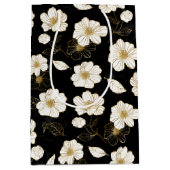 Wit en goud bloemmotief op zwart medium cadeauzakje (Voorkant)