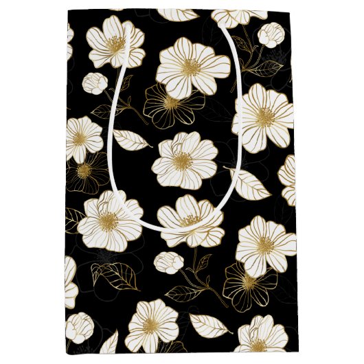 Wit en goud bloemmotief op zwart medium cadeauzakje (Voorkant)