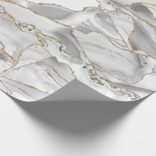 Wit en goudglitteraglaat cadeaupapier (Hoek)