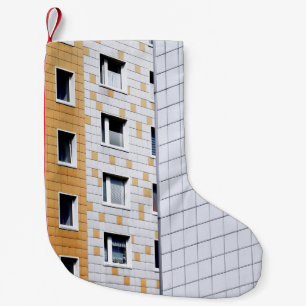 Wit en oranje gebouw kleine kerstsok