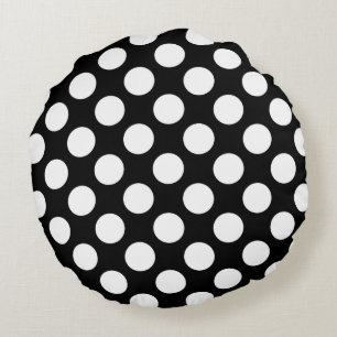 Wit en zwart polka dot patroon rond kussen