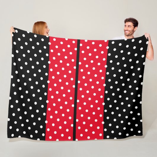 Wit gestippelde helderrode racestrepen op zwart fleece deken (In situ)