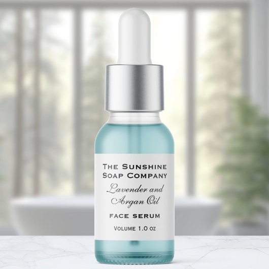 Wit klein flesje druppelaar flesetiket etiket