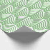 Wit kunstdecopatroon op groene achtergrond cadeaupapier (Hoek)