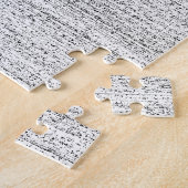 Wit lawaai. Zwarte en witte sneeuwgrijs. Legpuzzel (Zijkant)