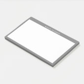 Wit monogram of naam op rand van mediumgrijs post-it® notes (Schuin)