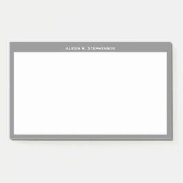 Wit monogram of naam op rand van mediumgrijs post-it® notes