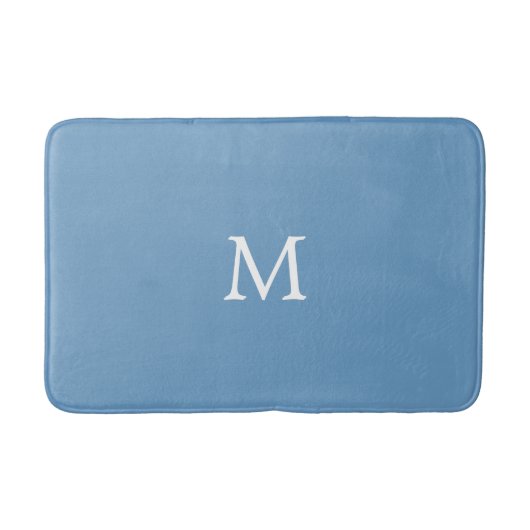 Wit monogram op medium blauw badmat (Voorkant)
