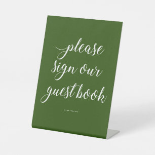 Wit op groen, gelieve te ondertekenen ons gastboek reclamebord met voetstuk