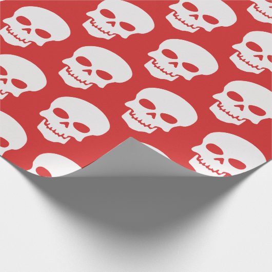 Wit op rode schedels cadeaupapier (Hoek)