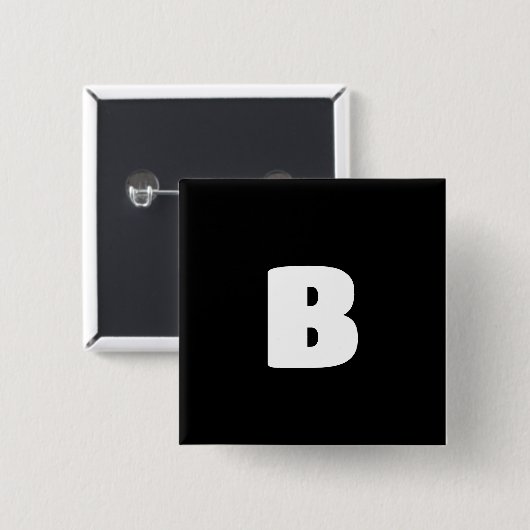 Wit vet initiaal op zwart vierkante button 5,1 cm (Voorkant /achterkant)