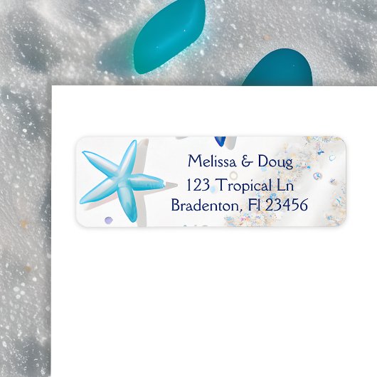 Wit Zand en Blauwe Zeesterren Strand Etiket