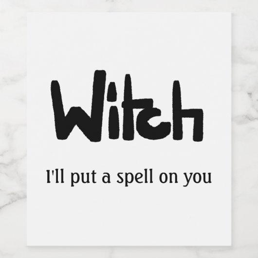 Witch in hand-lettered black ink saying wijn etiket (Enkel label)