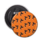 Witch with broom on orange button flesopener (Voorkant)