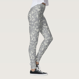 Witte abstracte op grijze leggings