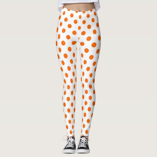 Witte achtergrond oranje stippen leggings (Voorkant)